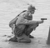 002 Firing pistol on beach.jpg