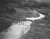 burma ww2 blown up railway bridge and new bridge next toit.jpg