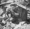 BU8356 Sgt. W. Harris, No 9 AFPU Super Ikonta camera rubble of a ruined building Germany (IWM).jpg