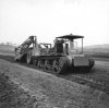 M3 Lee (or Grant) tank towing a Letourneau Carryall Scraper - 1948.jpg