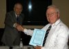 Michael Gottschalk receives honorary certificate from John Foster 1.jpg