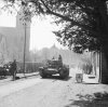 © IWM (BU 3338) A Valentine Mk XI artillery OP tank passing through Hopsten, 6 - 8 April 1945..jpg