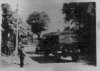 Truck driving through a town.jpg