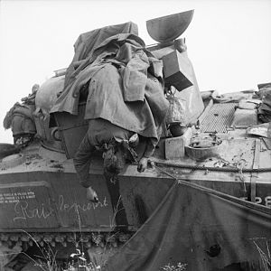 SSM William Parkes of No. 3 Squadron, 2nd (Armoured) Irish Guards, advance towards Eindhoven, Operation 'Market-Garden', 17 September 1944; IWM BU 927