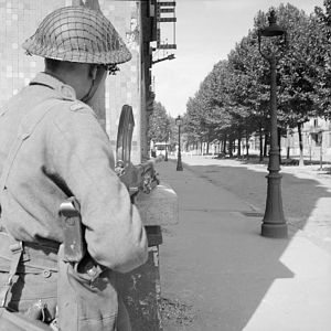 Bren gunner of the 5th Coldstream Guards covers a street in Arras, 1 September 1944; IWM BU 245