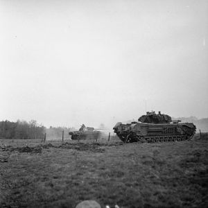 Churchill tank and behind a German Panther captured by 4th Coldstream Guards, Geijsteren castle on the banks of the Maas, 29 November 1944; IWM B 12184