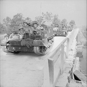 Carriers of 1st (Motor) Grenadier Guards, 5th Guards Armoured Brigade, Guards Armoured Division, Operation 'Goodwood', 18 July 1944; IWM B 7526