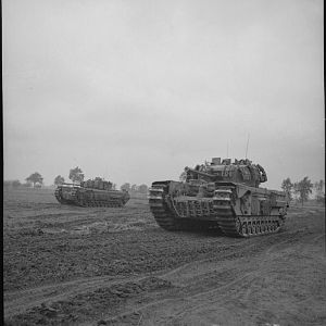 Churchill tanks of the 4th Grenadier Guards advance towards Venraij in Holland, 17 October 1944; IWM BU 1205