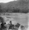 Crossing the Mekong - The natives managed the boats - note the current.jpg