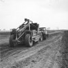 M3 Lee (or Grant) tank towing a Letourneau Carryall Scraper - post-war.jpg