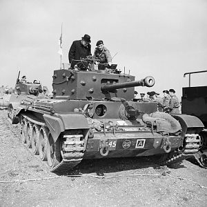Churchill inspects a Cromwell Mk IV, 2 Sqn, 2 (Armd Recce) Bn, Welsh Guards, Pickering Yorks, 31 March 1944; IWM H 37169