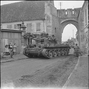 Cromwell tank of 2nd Welsh Guards, Guards Armoured Division, in Trie-Chateau, near Gisors, 31 August 1944; IWM BU 293